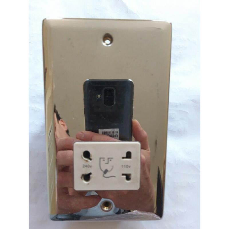 Chrome effect shaver socket