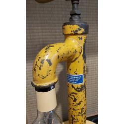 Unique industrial lamp made from a vintage water pump