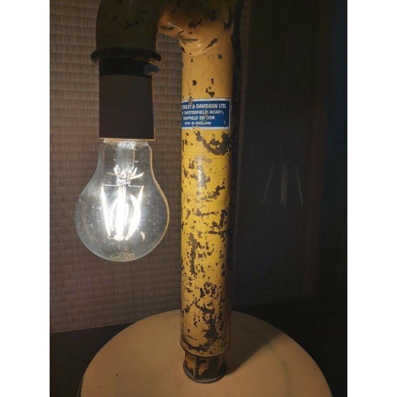 Unique industrial lamp made from a vintage water pump